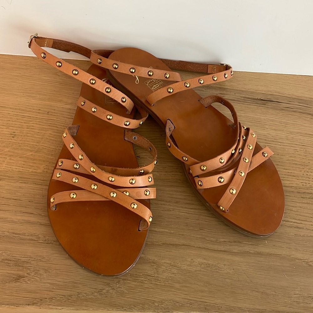 Women’s J Crew gladiator sandals.
